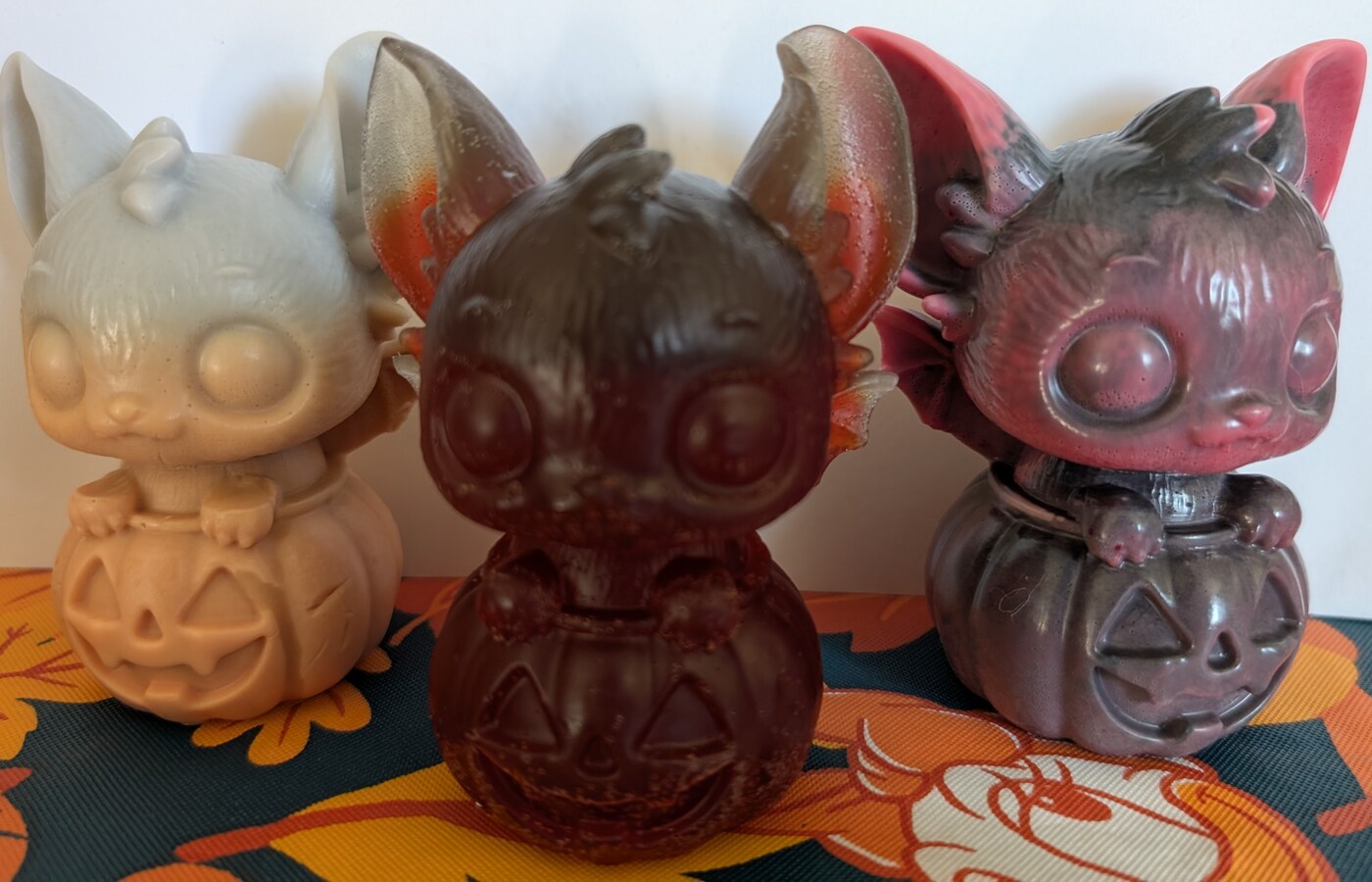 Midnight Pumpkin Bat soaps in cream, smoky brown, and smoky berry colors