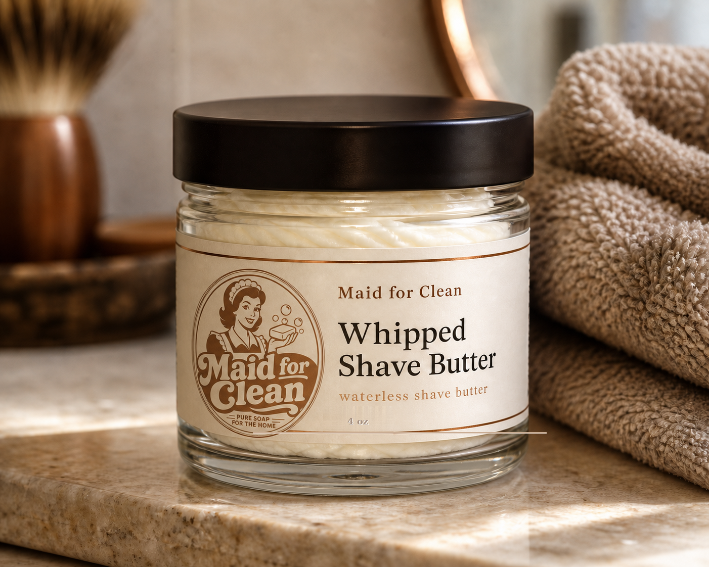 Whipped Shave Butter in a glass jar with a warm towel
